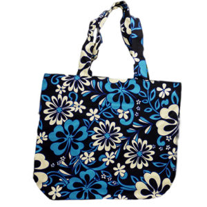 dark blue tote bag with white and blue flowers